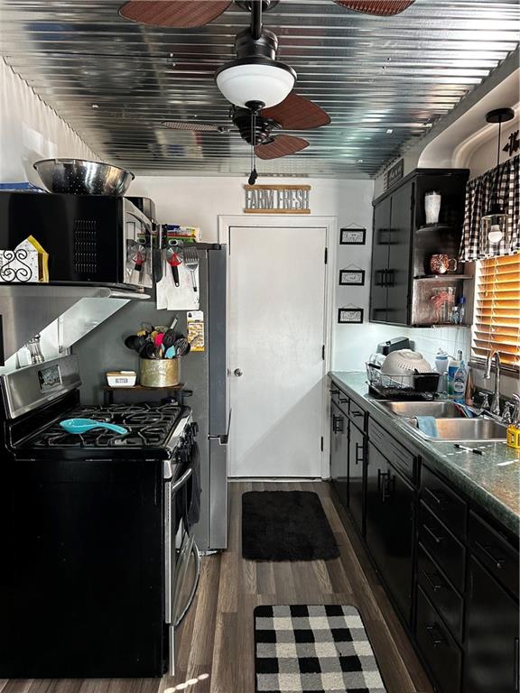 408 Craigdell Road New Kensington, PA 15068 - Photo 6 of 12 a kitchen with stainless steel appliances granite countertop a stove and cabinets
