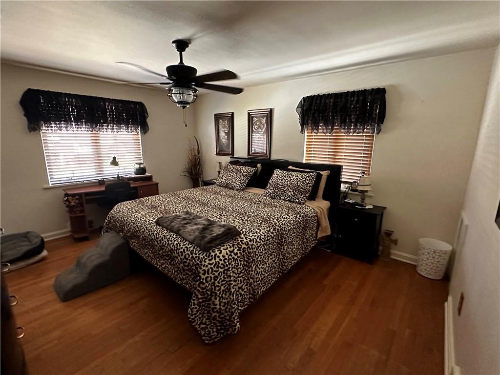 408 Craigdell Road New Kensington, PA 15068 - Photo 7 of 12 a bedroom with a bed a flat screen tv and window