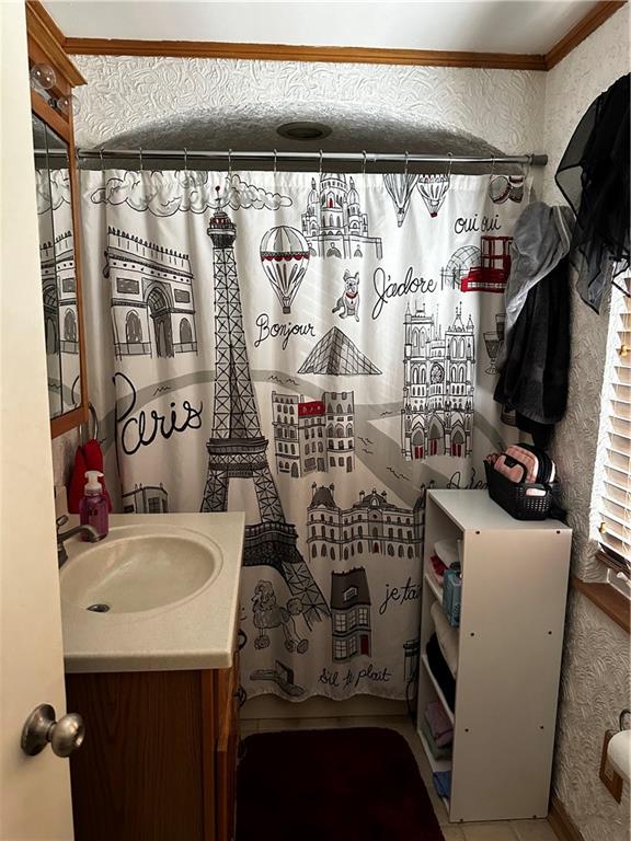 408 Craigdell Road New Kensington, PA 15068 - Photo 10 of 12 a bathroom with a sink and a mirror