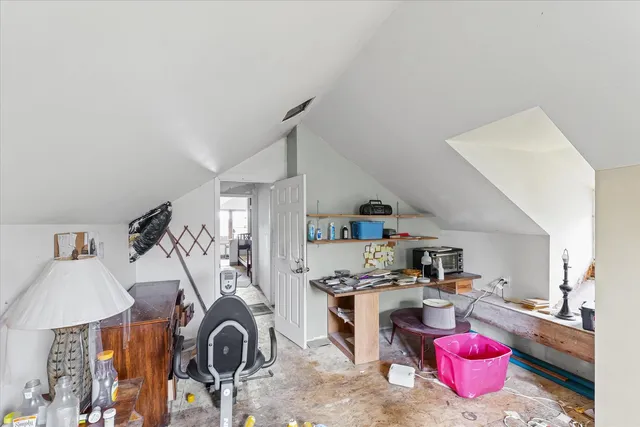 a view of a kitchen and dining room
