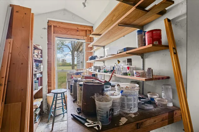 a room with lots of wooden furniture
