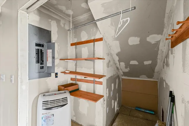 a room with furniture and a window