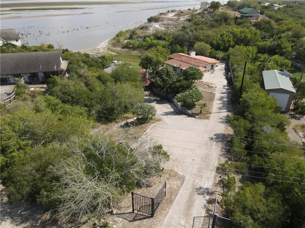 an aerial view of residential house with outdoor space