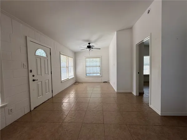 a view of an empty room and window