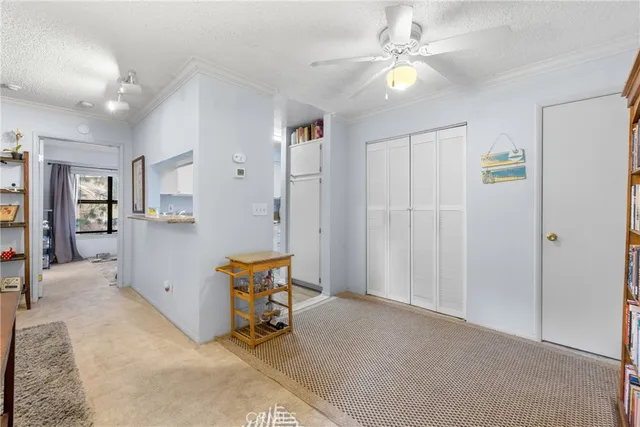 a view of a livingroom with a workspace