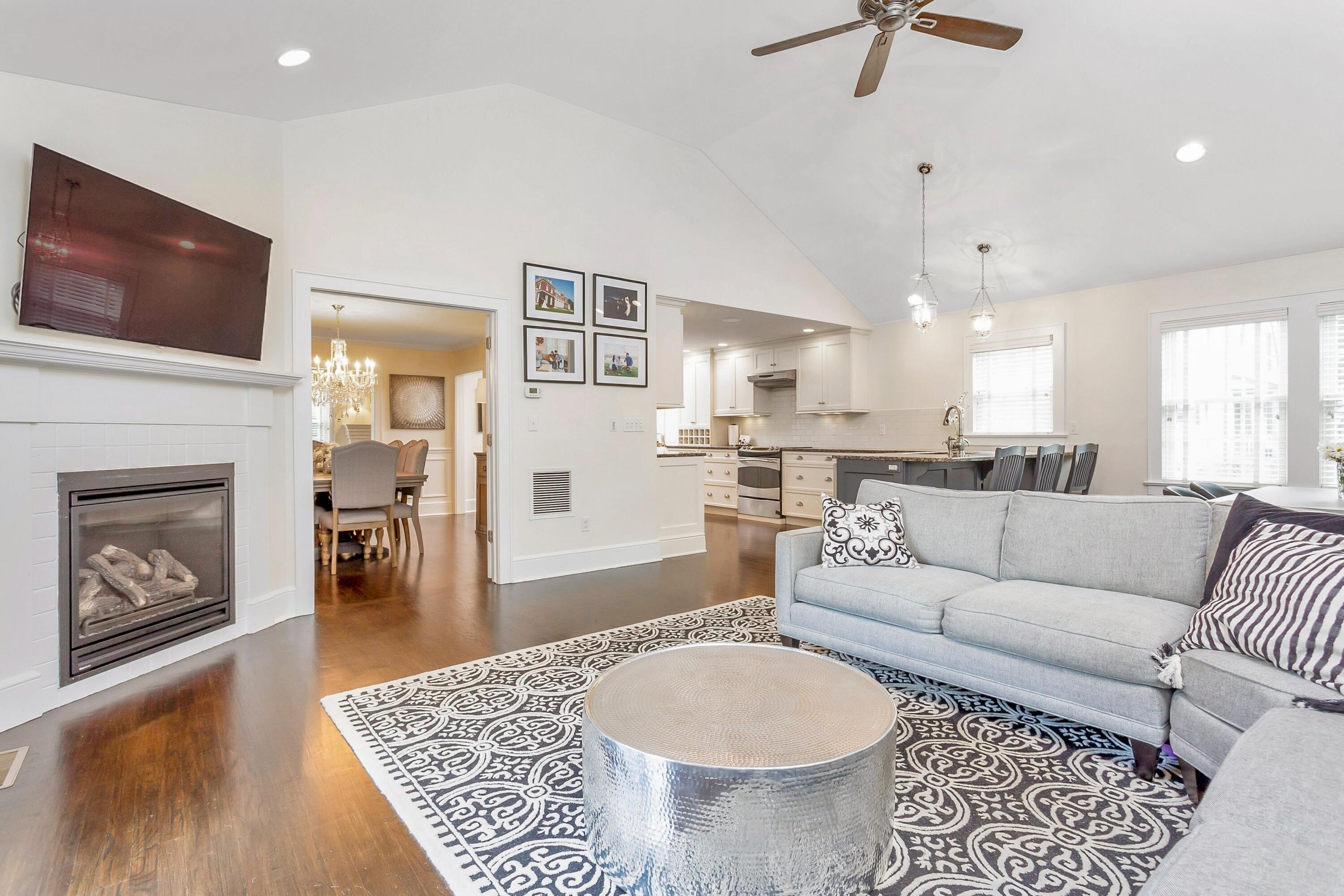 23 Renshaw Road Darien, CT 06820 - Photo 13 of 34 a living room with furniture and a flat screen tv