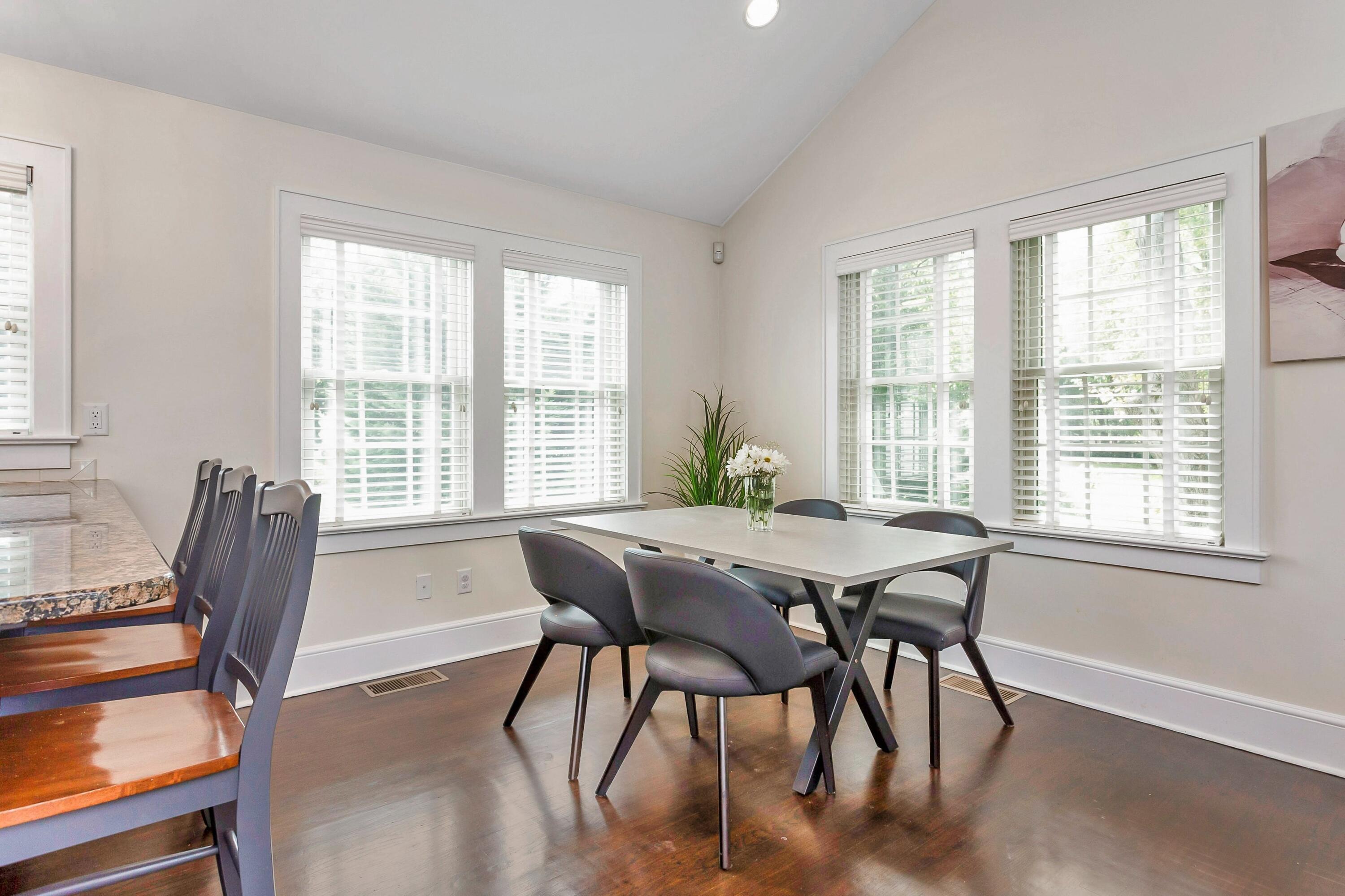 23 Renshaw Road Darien, CT 06820 - Photo 18 of 34 a view of a dining room with furniture window and outside view