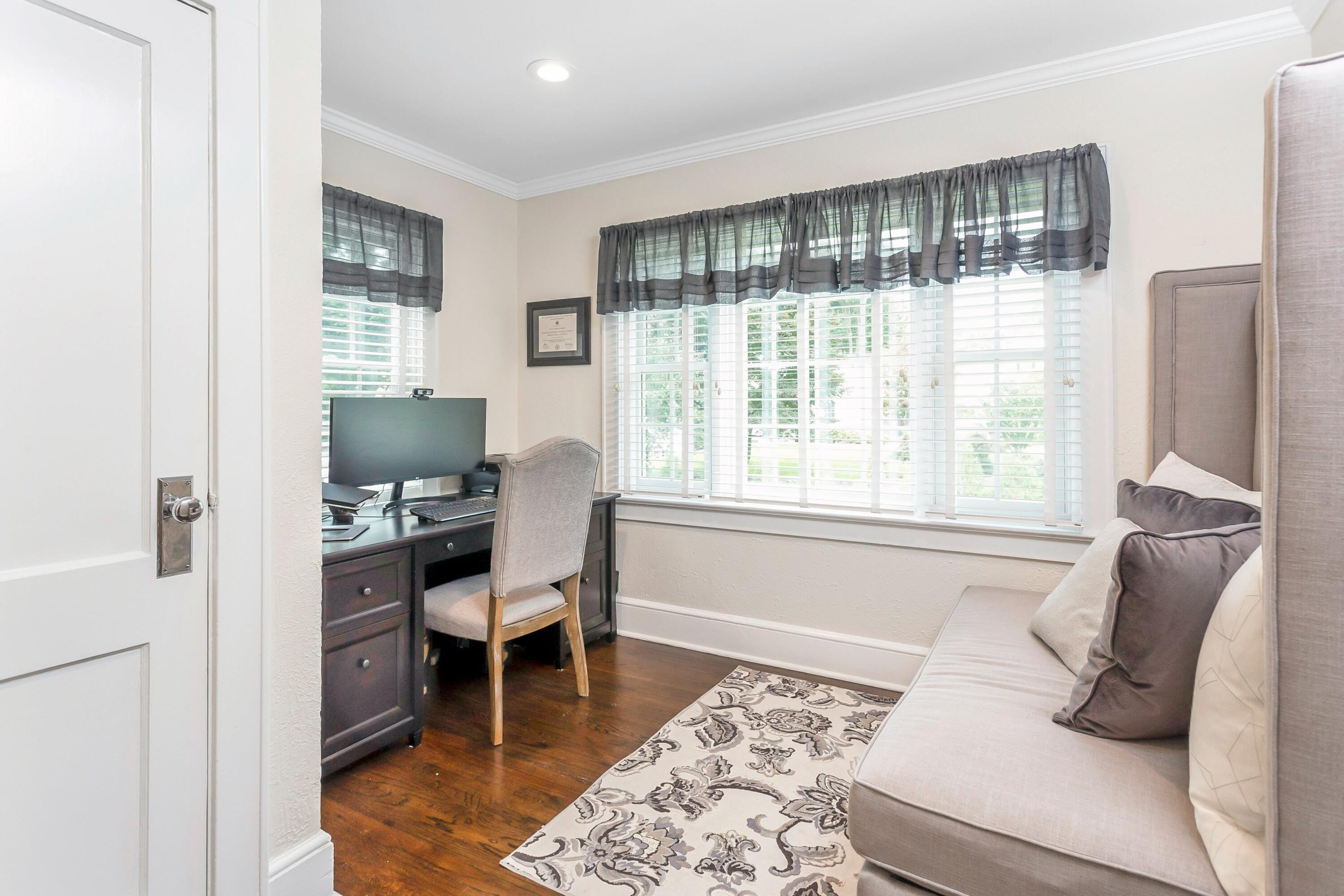 23 Renshaw Road Darien, CT 06820 - Photo 19 of 34 a living room with furniture and a window