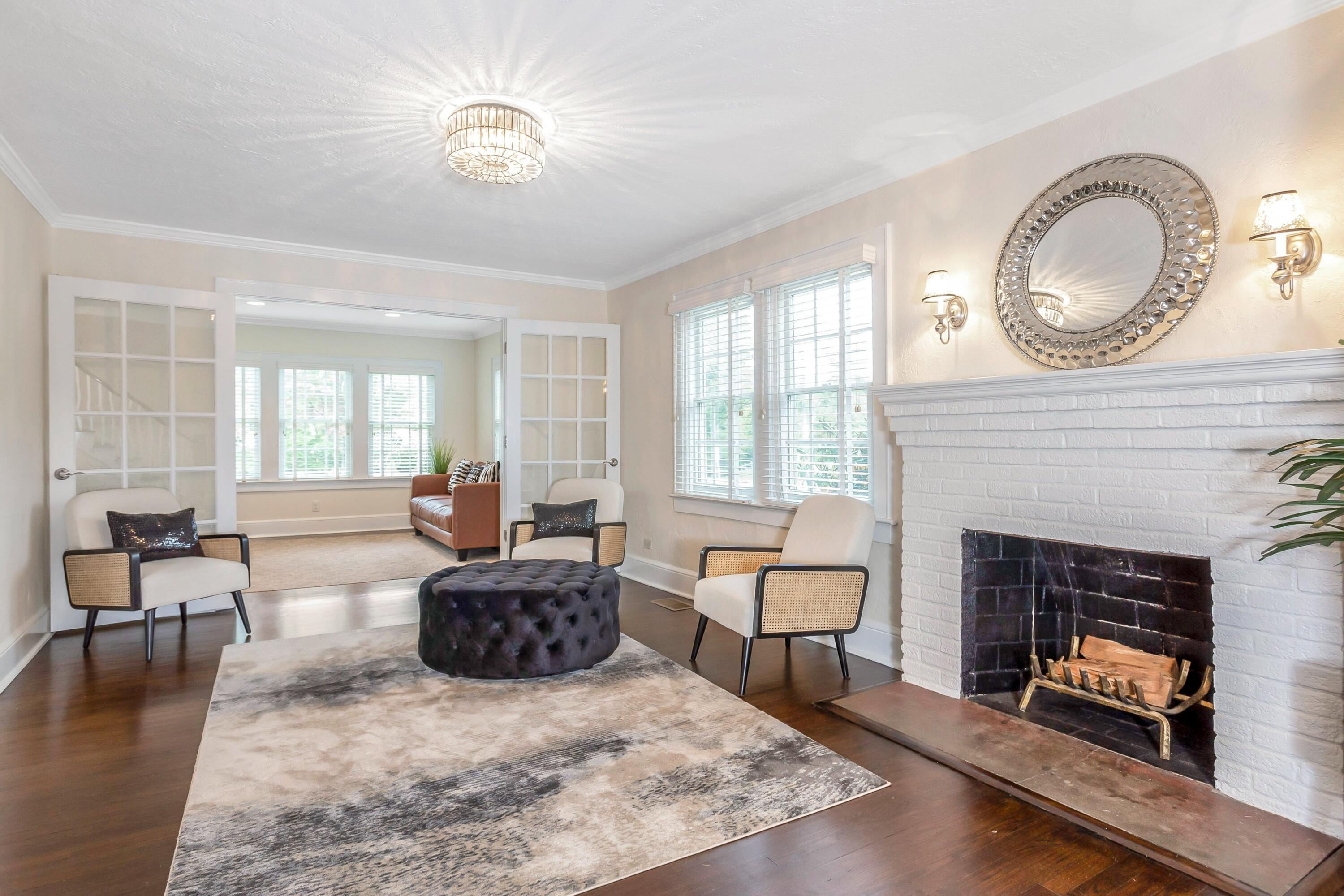 23 Renshaw Road Darien, CT 06820 - Photo 4 of 34 a living room with furniture and a fireplace