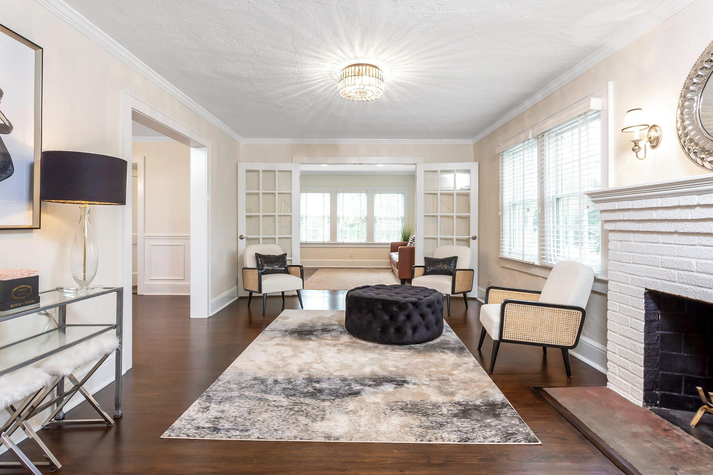 23 Renshaw Road Darien, CT 06820 - Photo 5 of 34 a living room with furniture fireplace and window