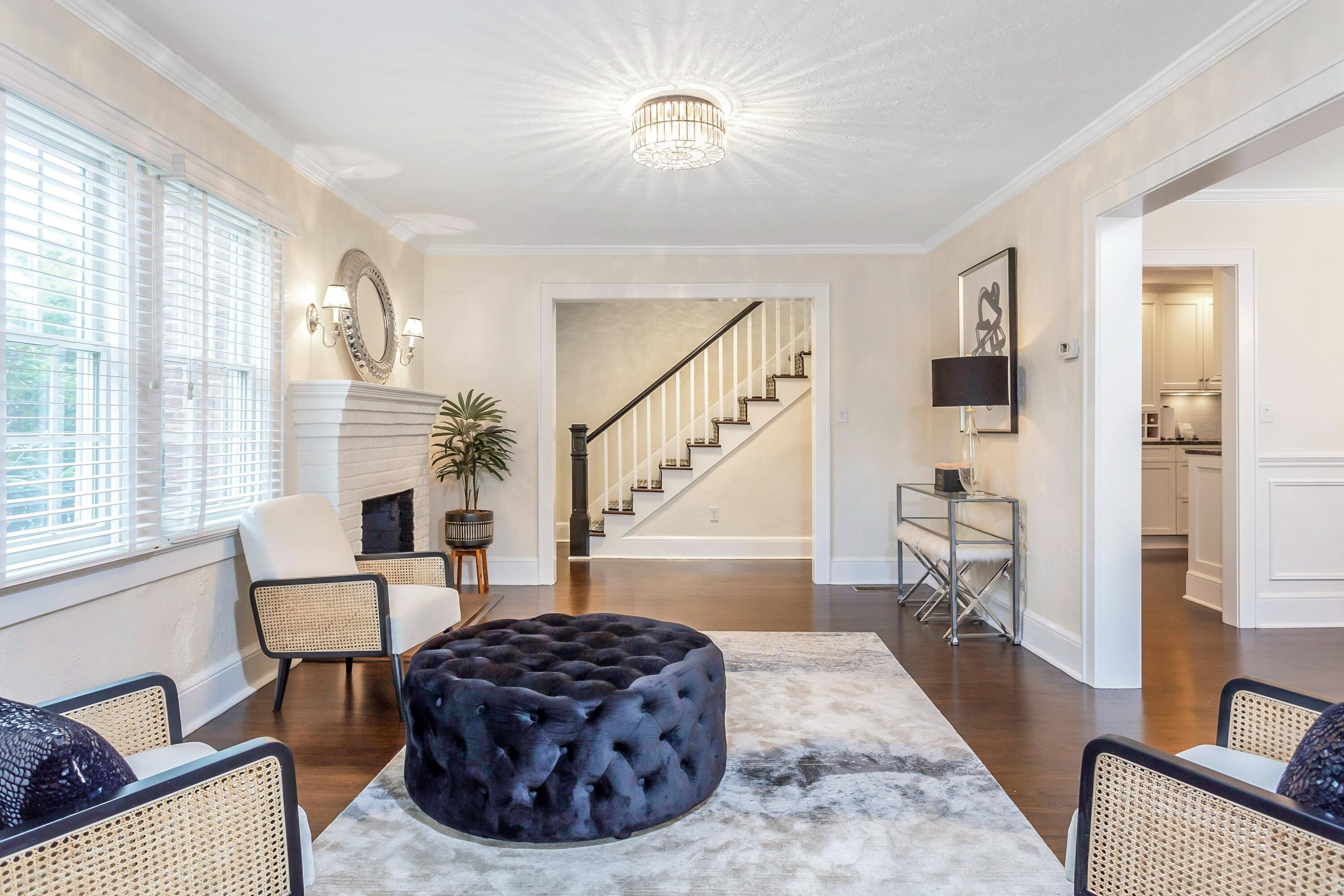23 Renshaw Road Darien, CT 06820 - Photo 6 of 34 a living room with furniture and a chandelier