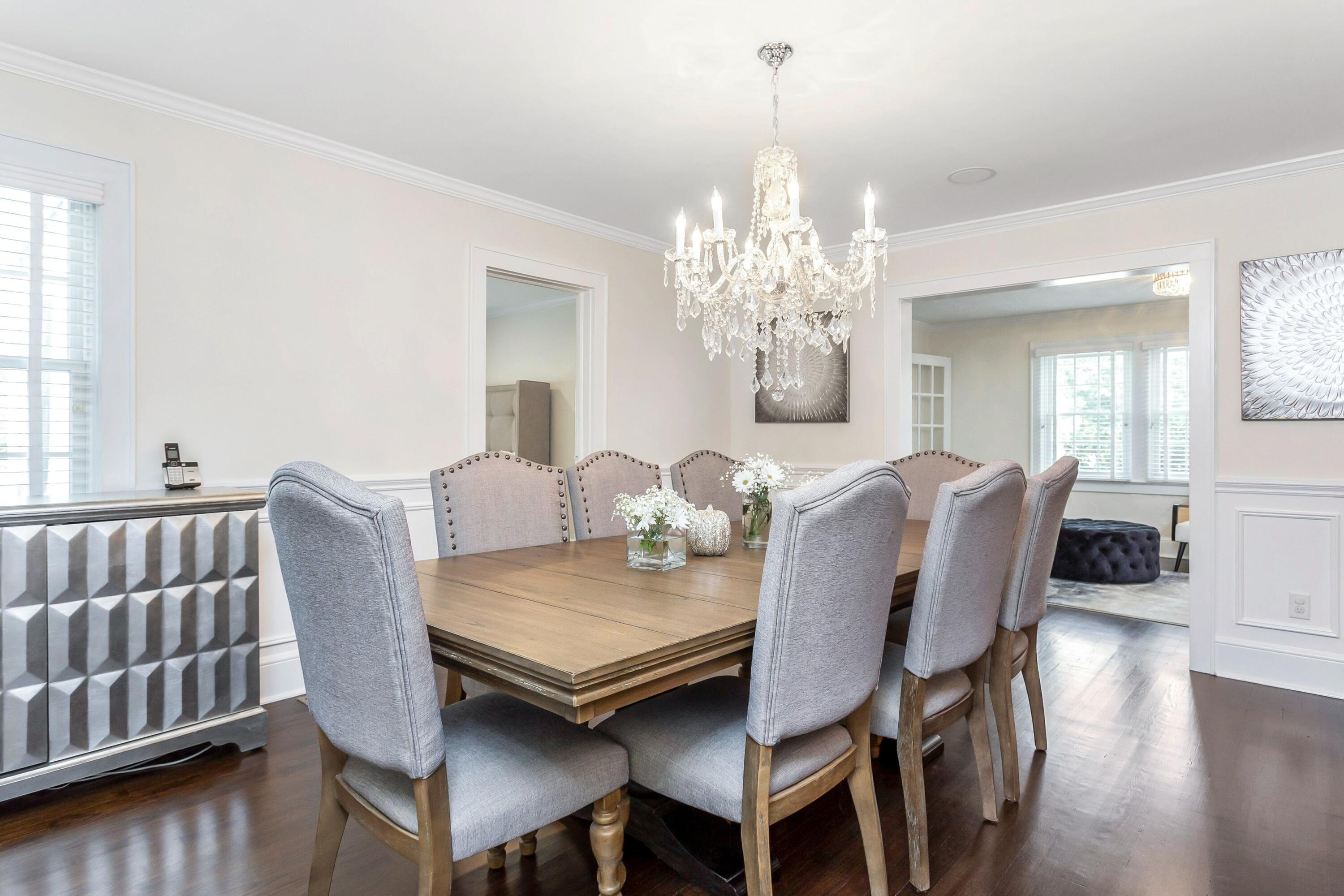 23 Renshaw Road Darien, CT 06820 - Photo 8 of 34 a view of a dining room with furniture and wooden floor