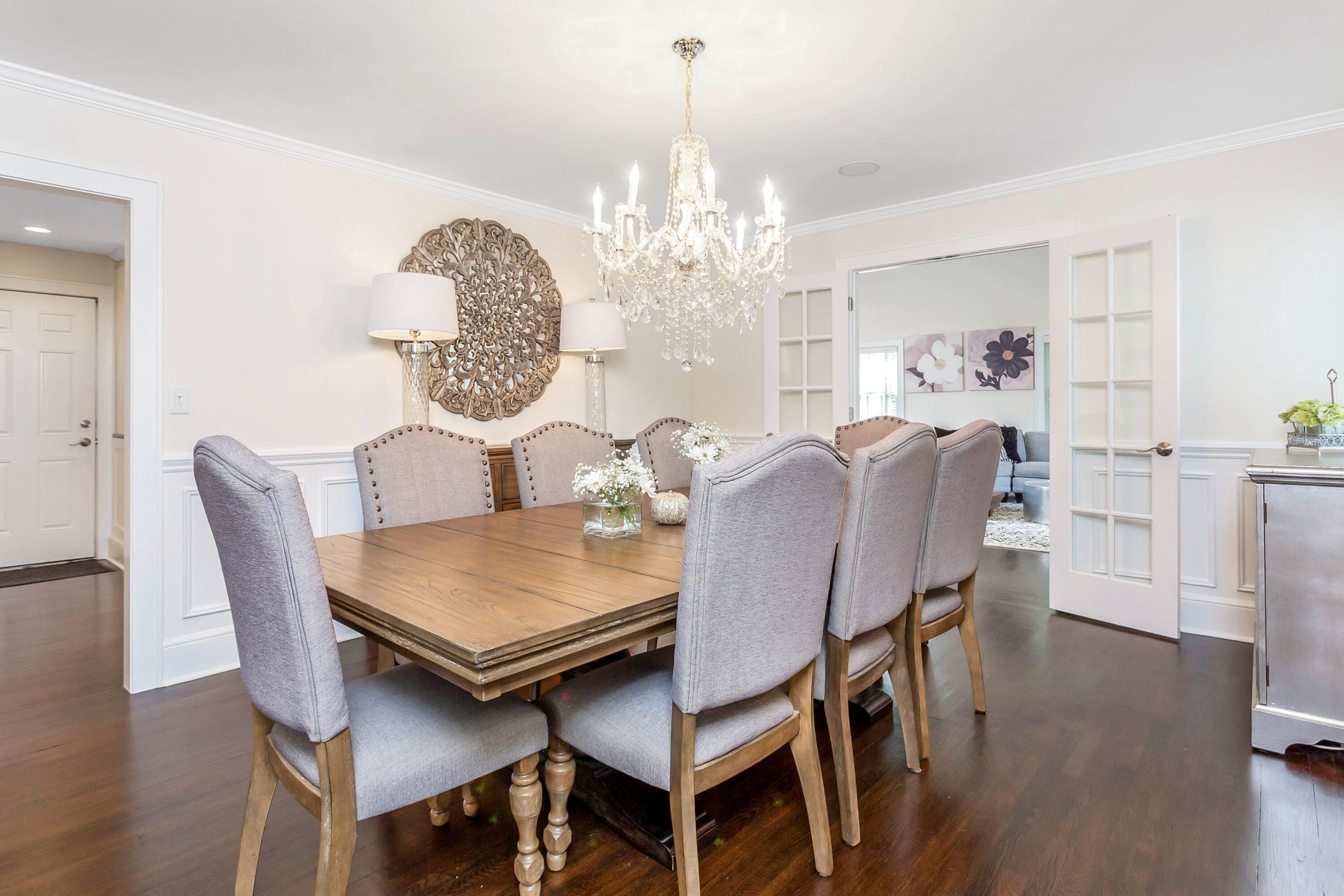 23 Renshaw Road Darien, CT 06820 - Photo 9 of 34 a view of a dining room with furniture and wooden floor