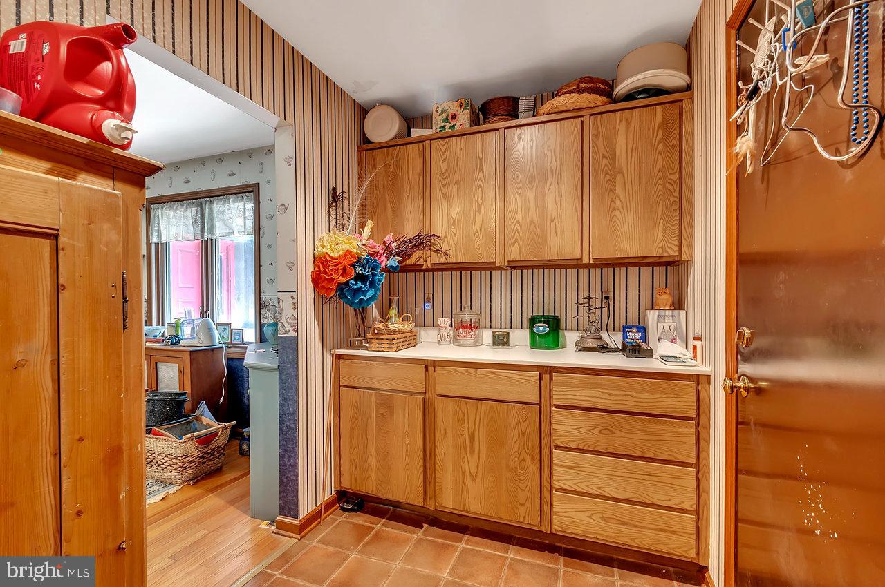 145 White Pine Road Chesterfield, NJ 08515 - Photo 16 of 48 a kitchen with a refrigerator and window