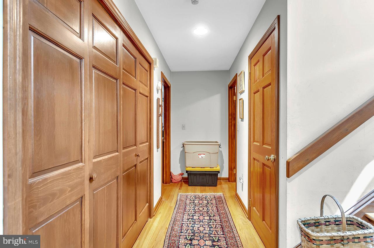 145 White Pine Road Chesterfield, NJ 08515 - Photo 20 of 48 a view of a hallway with a door and wooden floor