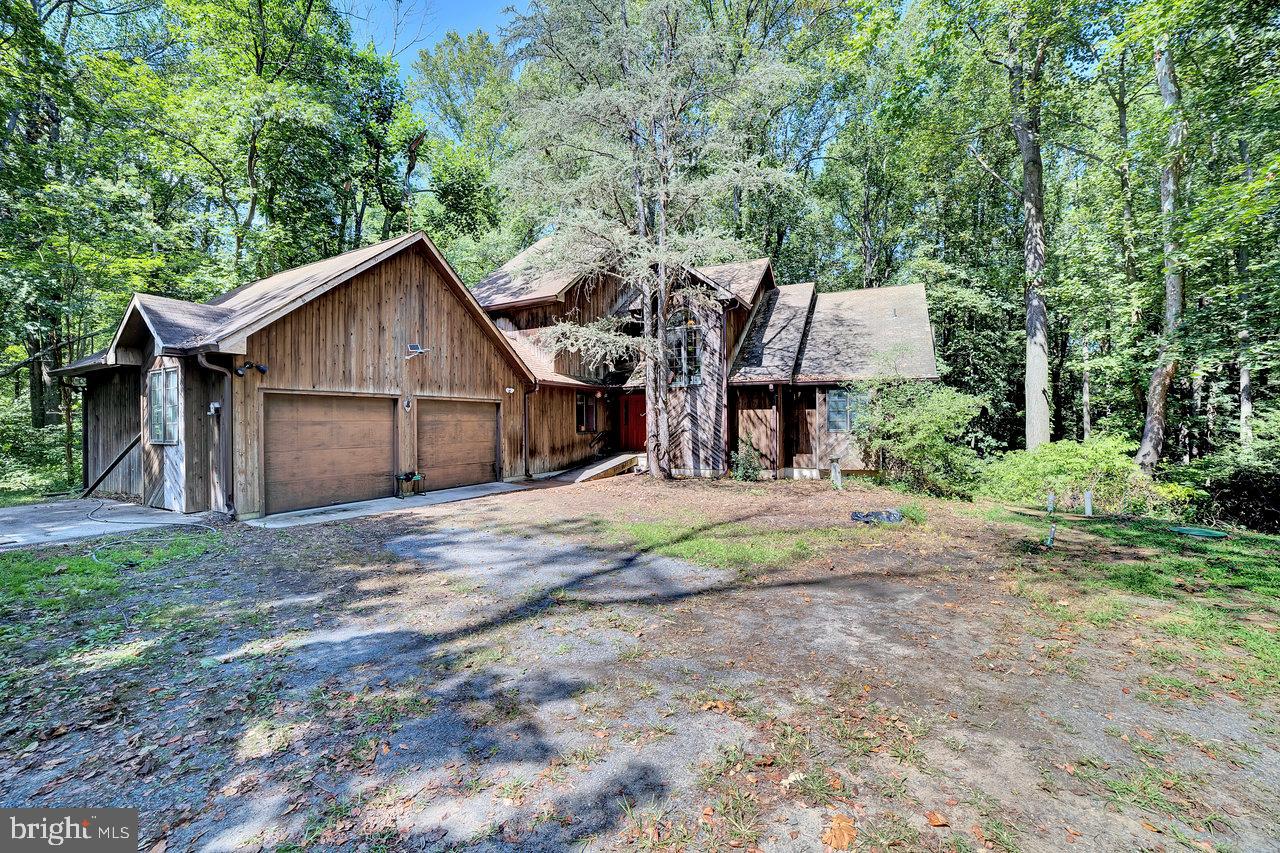 145 White Pine Road Chesterfield, NJ 08515 - Photo 35 of 48 a house with trees in the background