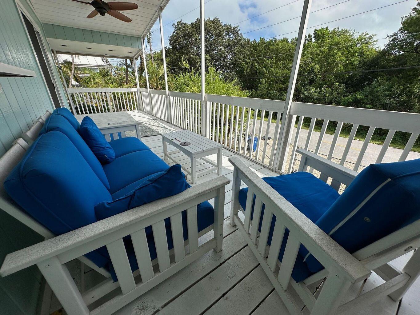 3 Meridian Avenue Key Largo, FL 33037 - Photo 2 of 18 a view of a balcony with furniture