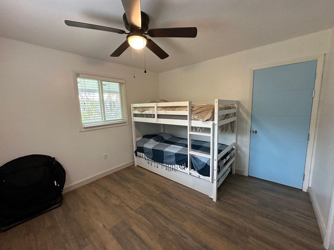 3 Meridian Avenue Key Largo, FL 33037 - Photo 8 of 18 a view of a livingroom with furniture and chandelier fan