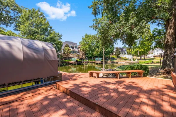 a view of a lake with a yard