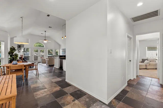 a view of a living room and dining room