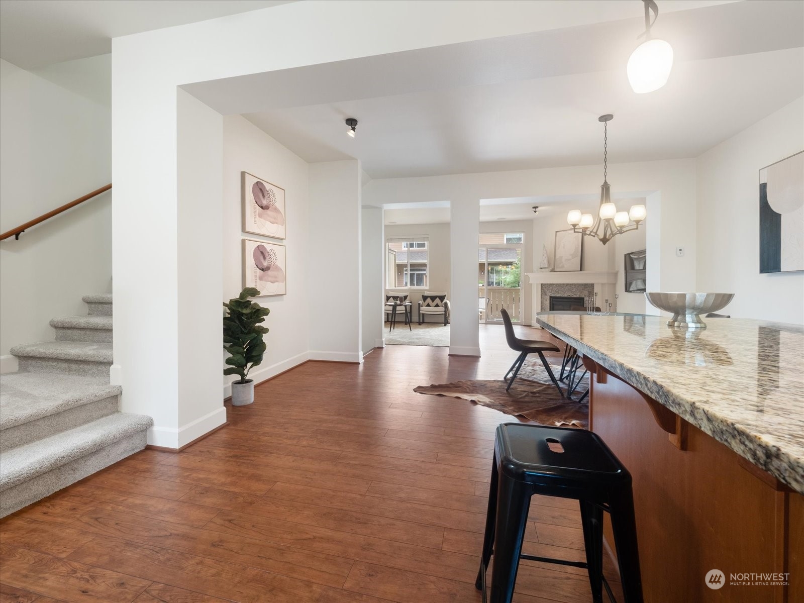 4625 Northeast 3rd Lane, Unit G3 Renton, WA 98059 - Photo 15 of 40 a dining room with furniture and wooden floor