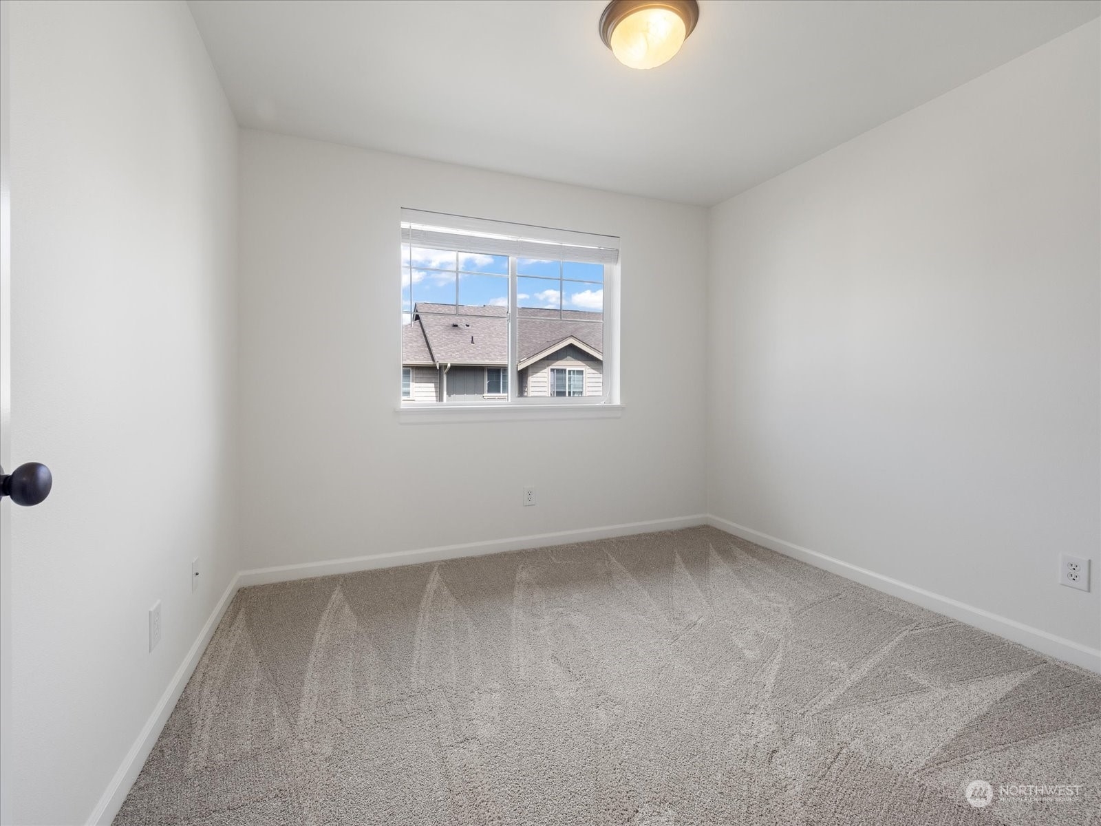 4625 Northeast 3rd Lane, Unit G3 Renton, WA 98059 - Photo 23 of 40 an empty room with a window