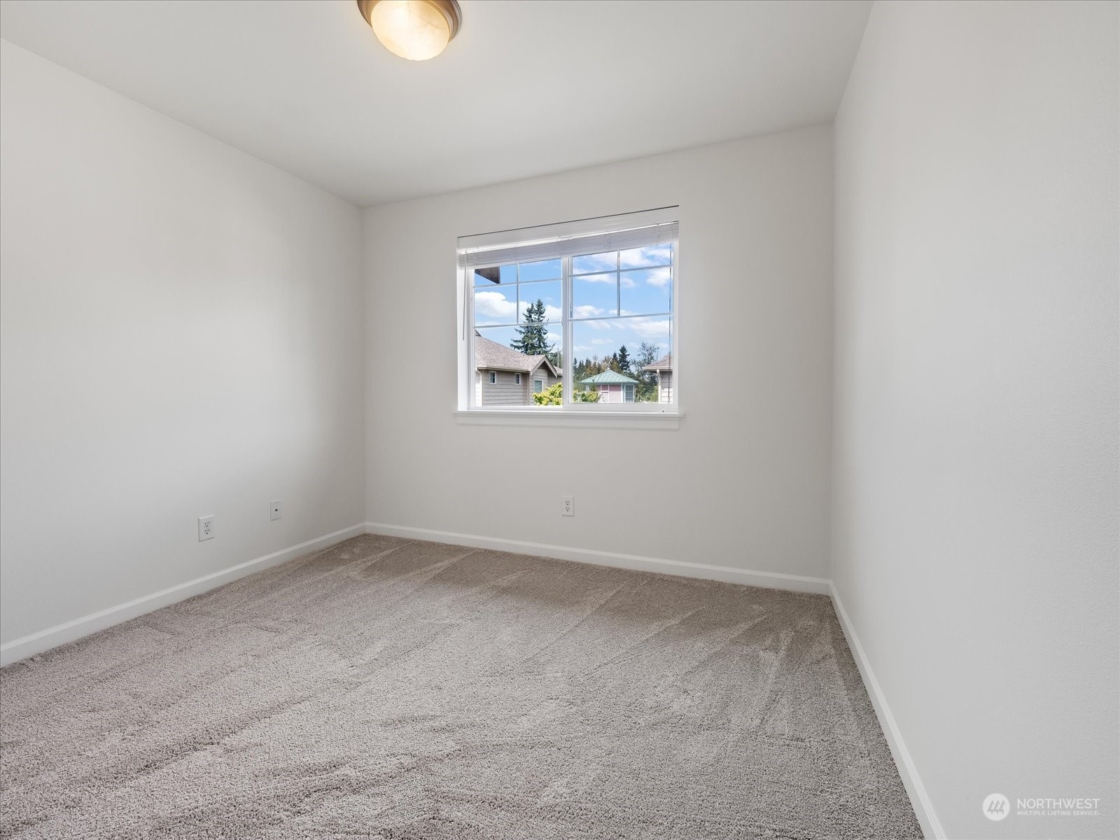 4625 Northeast 3rd Lane, Unit G3 Renton, WA 98059 - Photo 25 of 40 an empty room with a window