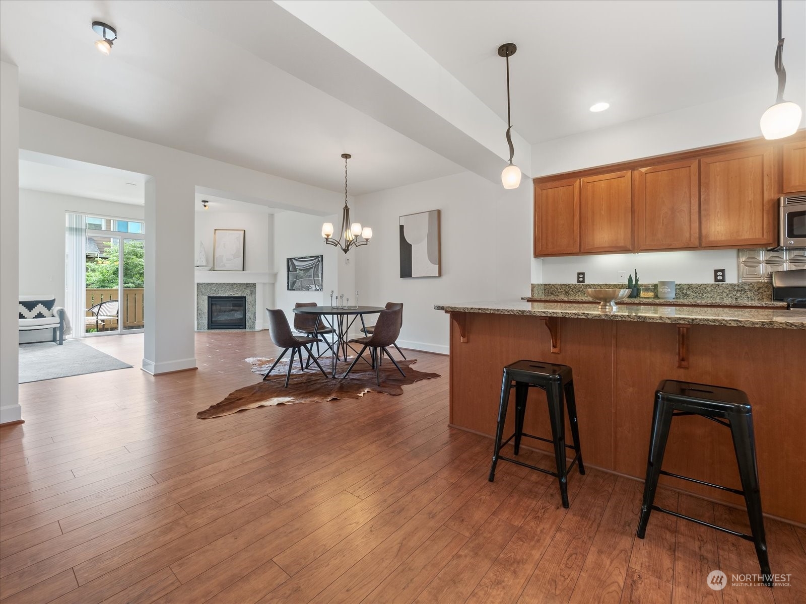 4625 Northeast 3rd Lane, Unit G3 Renton, WA 98059 - Photo 8 of 40 a kitchen with stainless steel appliances granite countertop sink stove top oven and cabinets