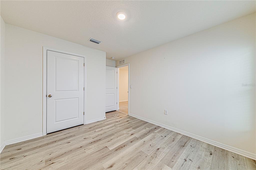 34026 Soaring Bamboo Path Wesley Chapel, FL 33543 - Photo 25 of 34 a view of an empty room