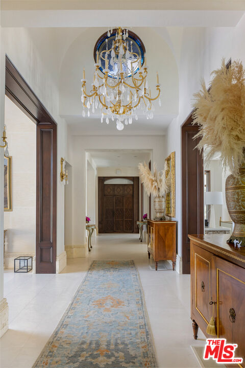 1940 Bel Air Road Los Angeles, CA 90077 - Photo 18 of 25 a view of livingroom with kitchen