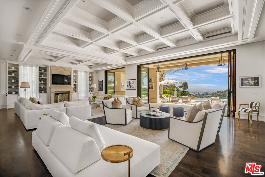1940 Bel Air Road Los Angeles, CA 90077 - Photo 4 of 25 a living room with furniture and a large window