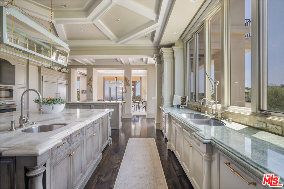 1940 Bel Air Road Los Angeles, CA 90077 - Photo 5 of 25 a large kitchen with a lot of counter space