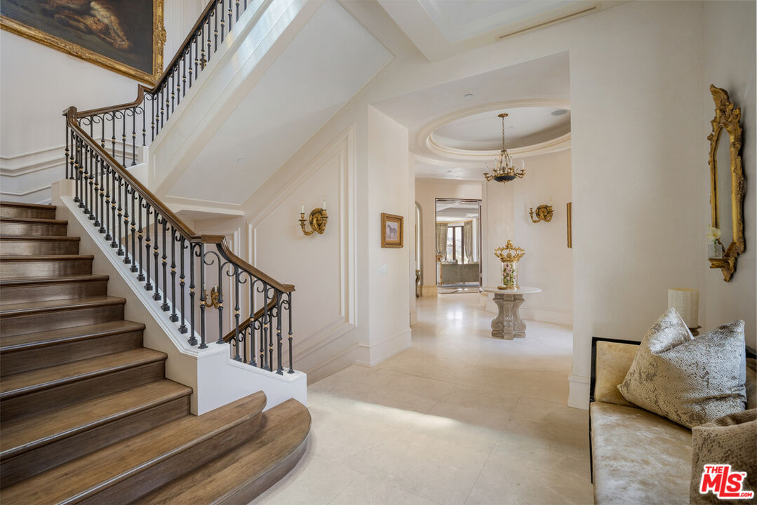 1940 Bel Air Road Los Angeles, CA 90077 - Photo 6 of 25 a view of entryway and hall with wooden floor