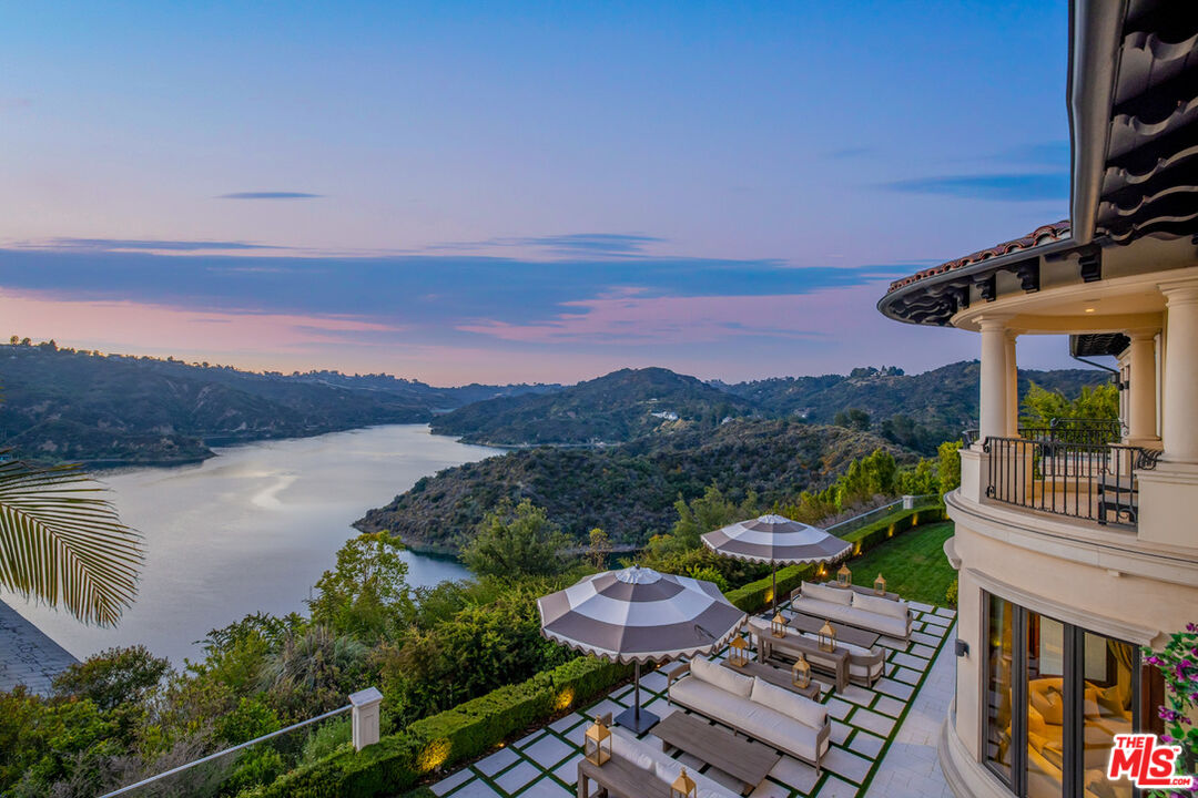 1940 Bel Air Road Los Angeles, CA 90077 - Photo 9 of 25 a view of a table and chairs on the roof deck