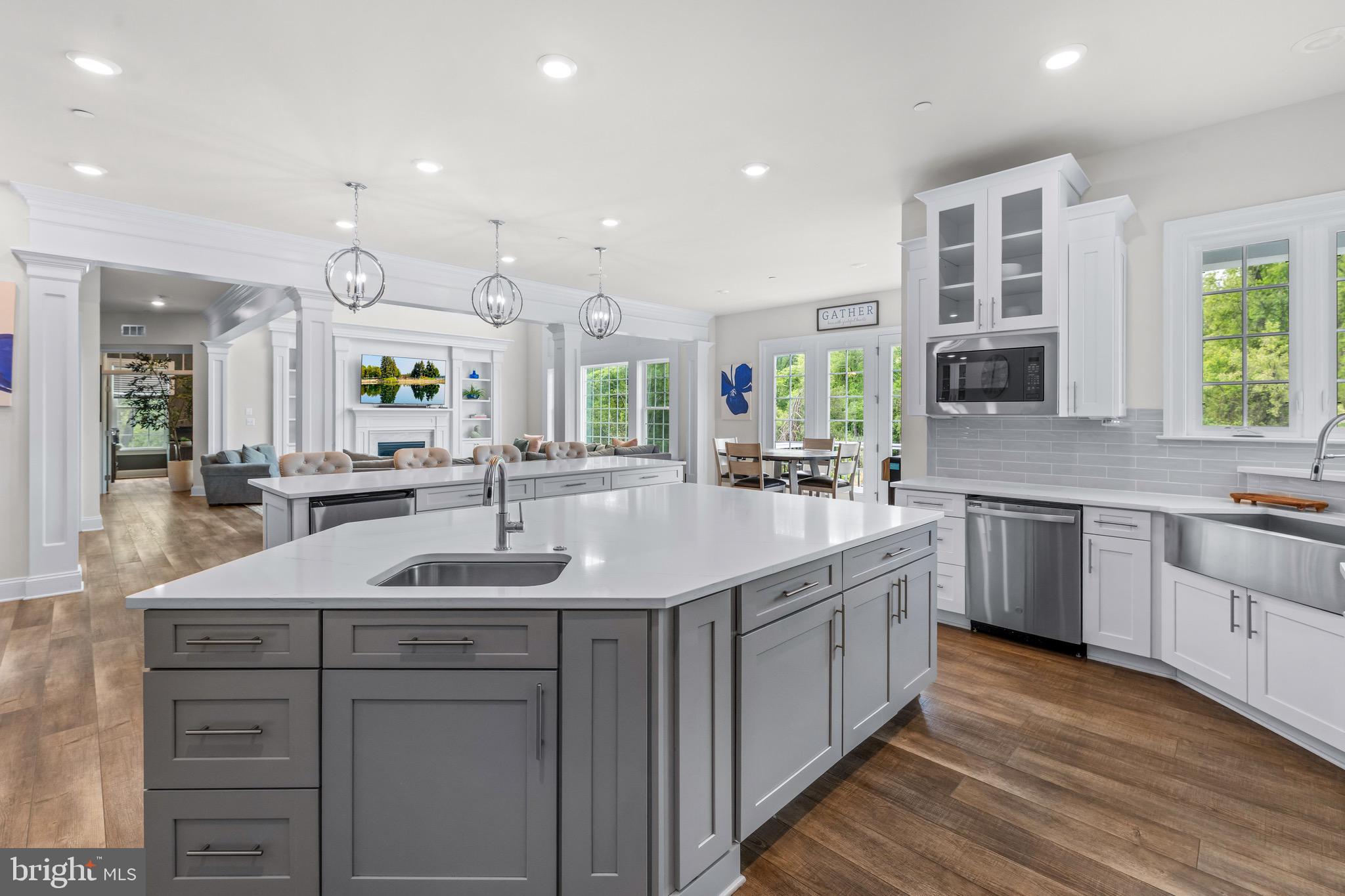 12201 Mayapple Trail Sykesville, MD 21784 - Photo 18 of 75 a kitchen with a sink and cabinets