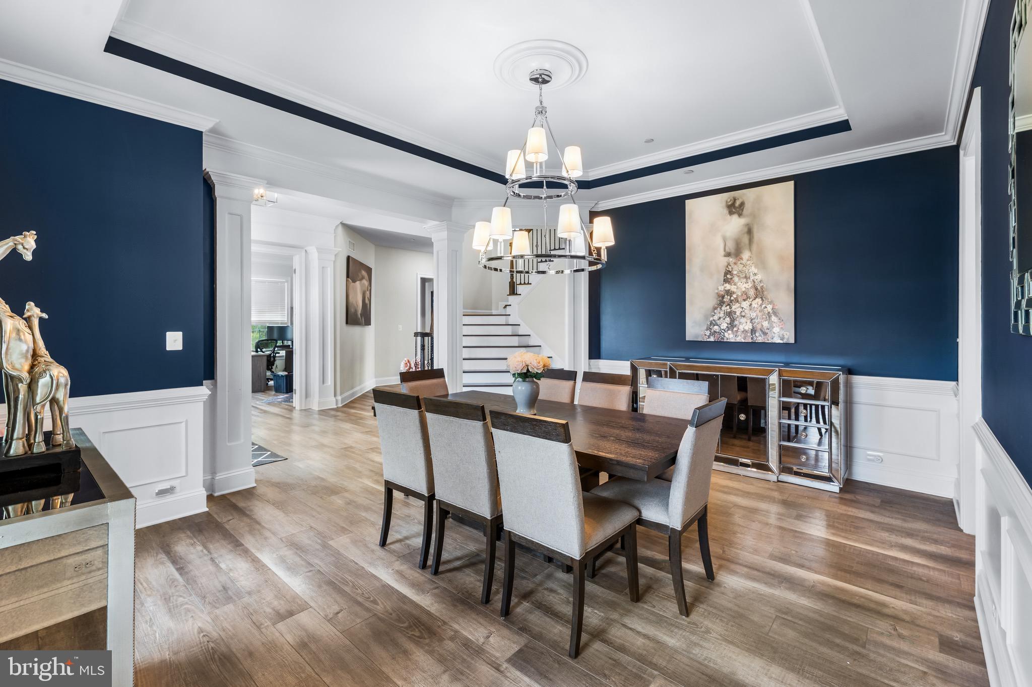 12201 Mayapple Trail Sykesville, MD 21784 - Photo 27 of 75 a view of a dining room with furniture and wooden floor