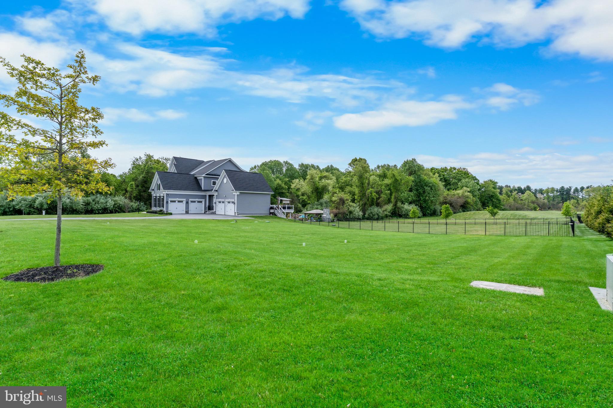 12201 Mayapple Trail Sykesville, MD 21784 - Photo 5 of 75 a view of a house with a big yard