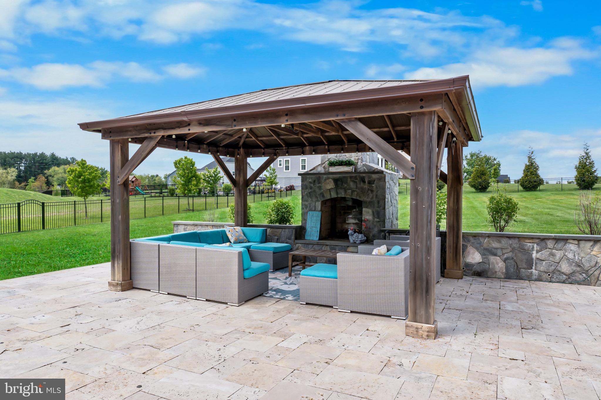 12201 Mayapple Trail Sykesville, MD 21784 - Photo 68 of 75 a view of house with backyard and outdoor seating