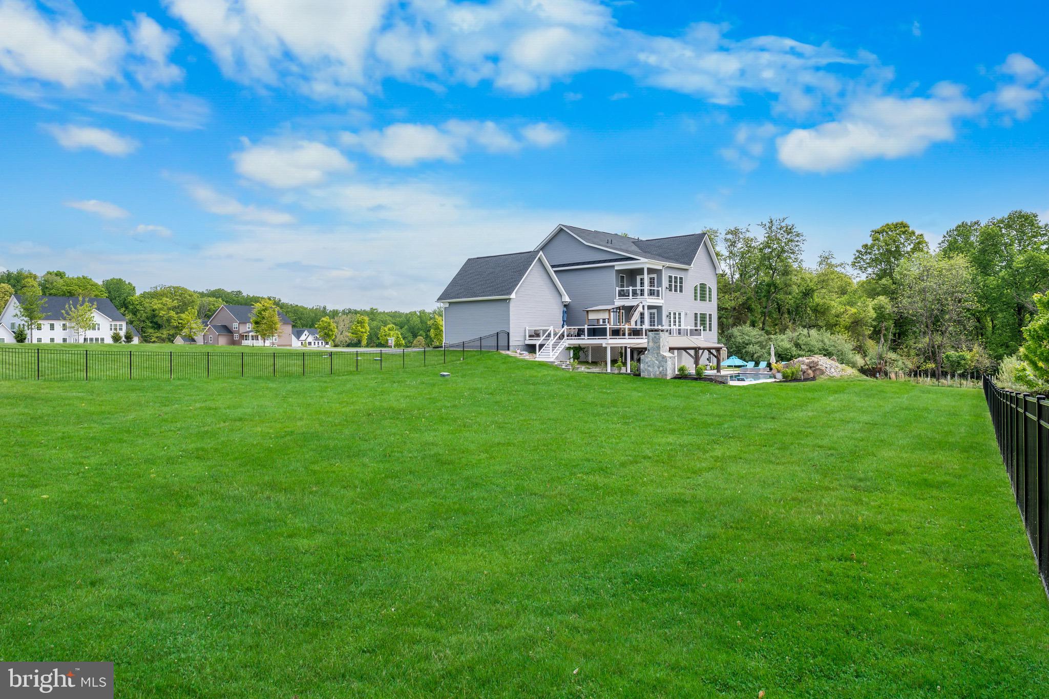 12201 Mayapple Trail Sykesville, MD 21784 - Photo 74 of 75 a view of a house with a big yard