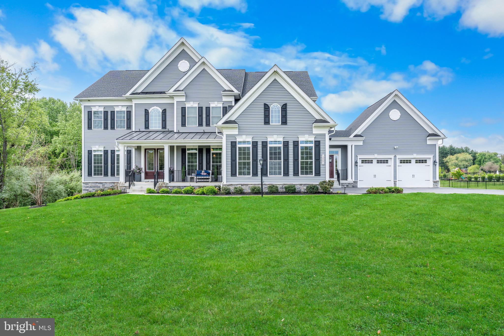 12201 Mayapple Trail Sykesville, MD 21784 - Photo 75 of 75 a view of a house with a big yard and large trees