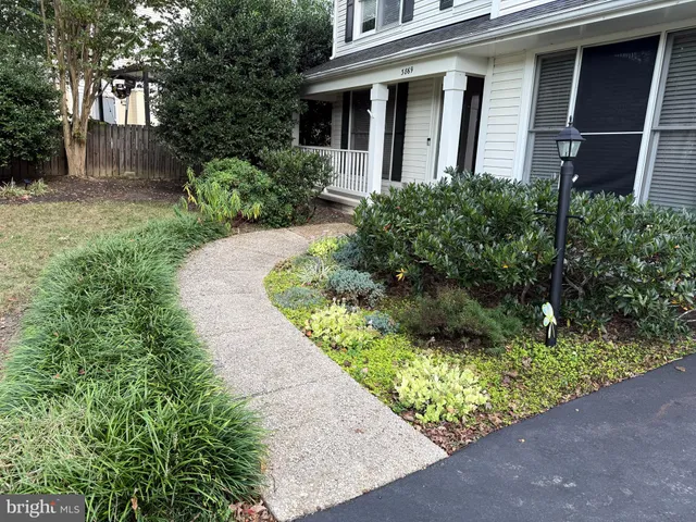 a front view of house with yard