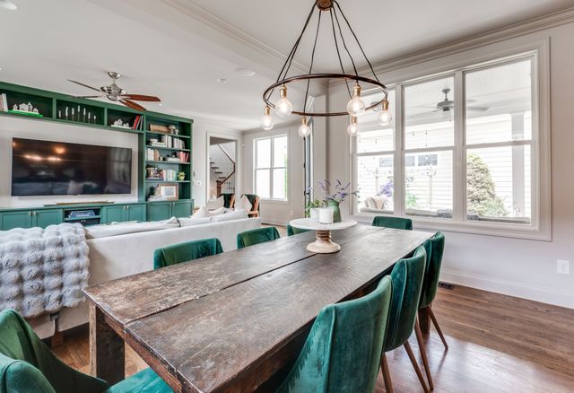 a kitchen with stainless steel appliances a stove sink and cabinets