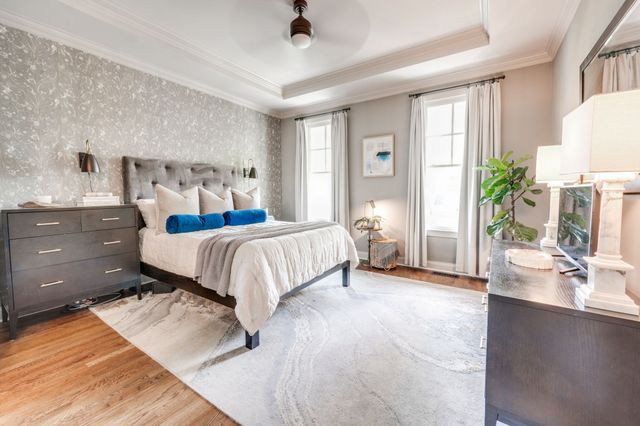a spacious bathroom with a double vanity sink and a mirror