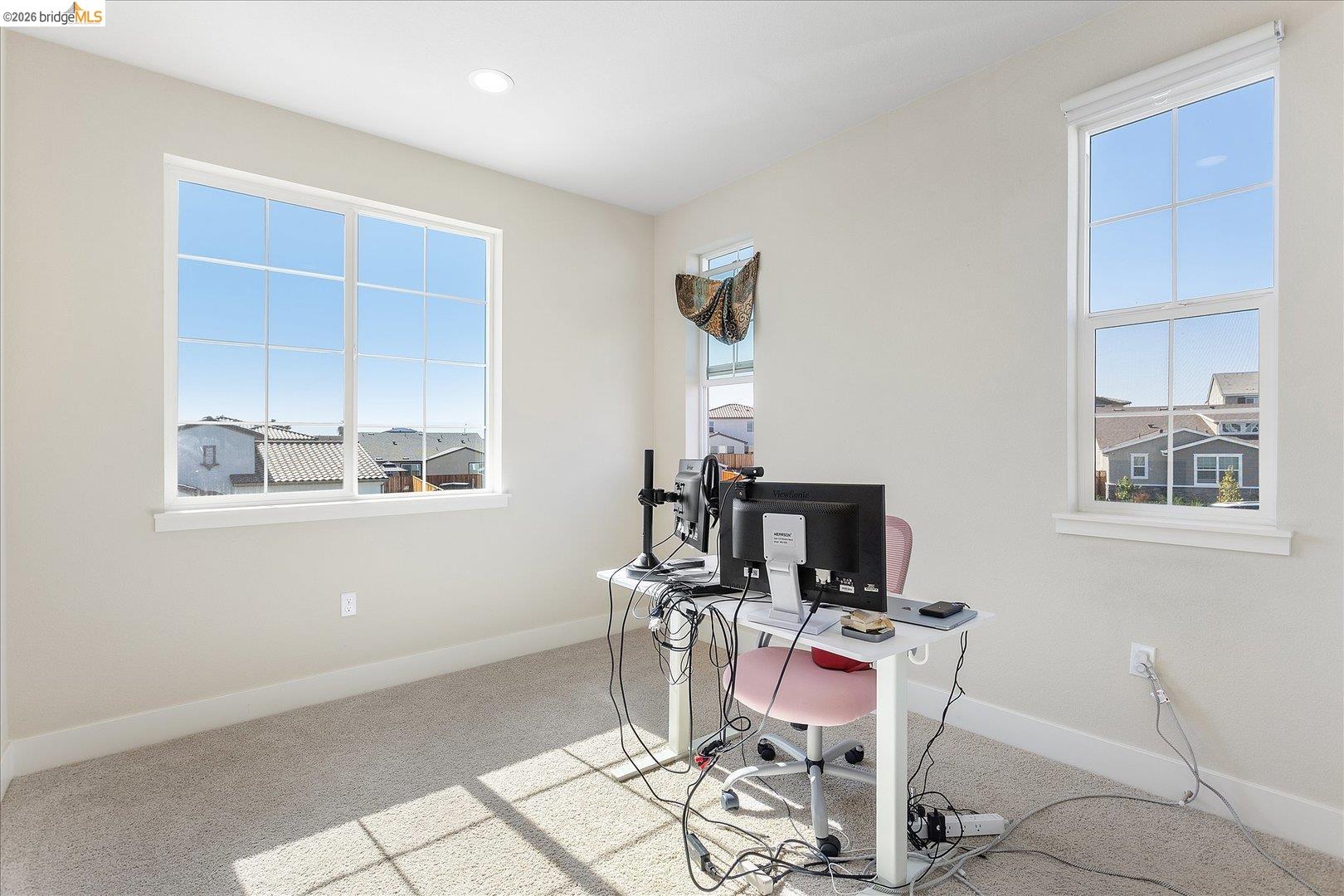 5601 Ridgepoint Way Antioch, CA 94531 - Photo 33 of 59 Room featuring light-colored carpet, white baseboards, and neutral wall paint