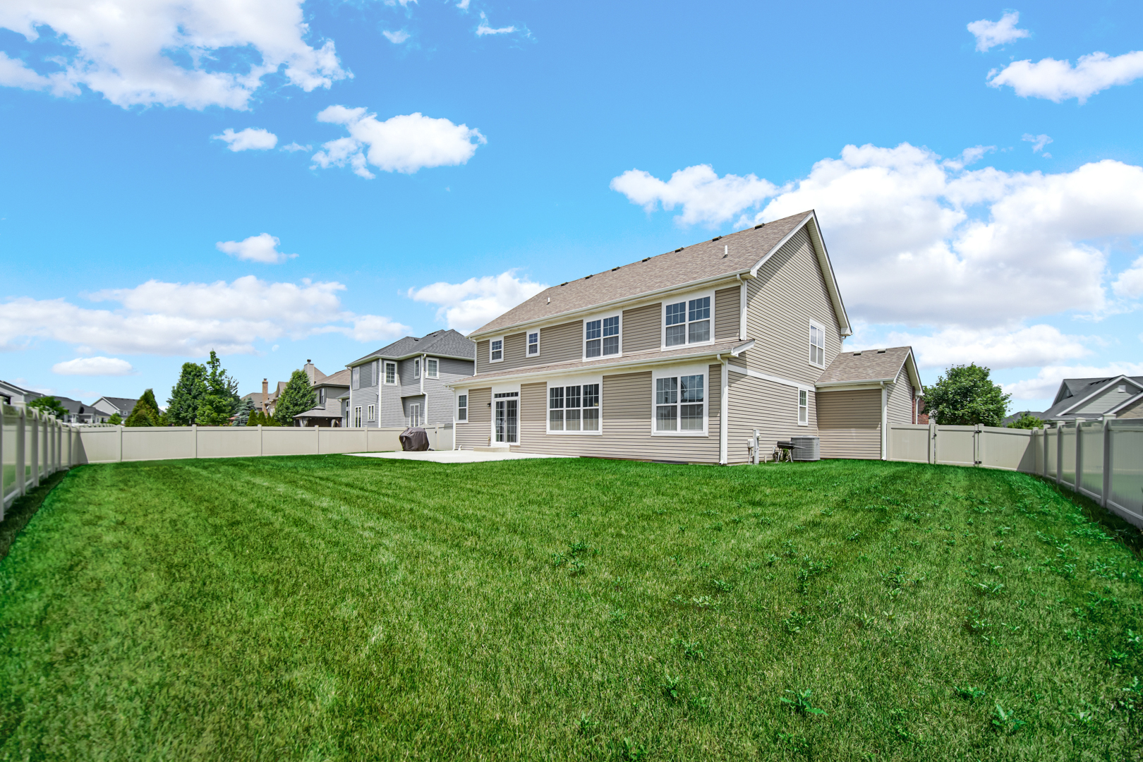 16512 Mueller Circle Plainfield, IL 60586 - Photo 29 of 29 a view of a house with backyard and garden