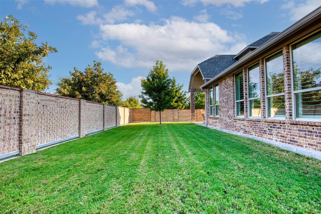 7760 Hackamore Street Frisco, TX 75036 - Photo 35 of 40 Grassy yard that’s spacious enough for a pool or playset.