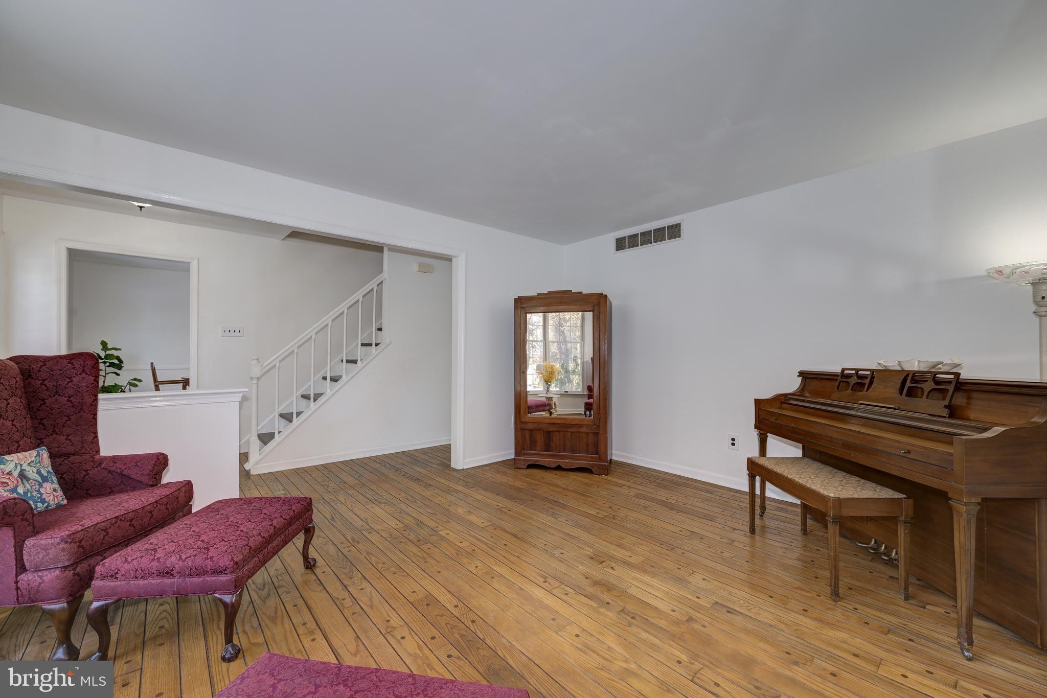 12 Friar Tuck Drive Medford, NJ 08055 - Photo 15 of 68 a view of a livingroom with furniture and staircase