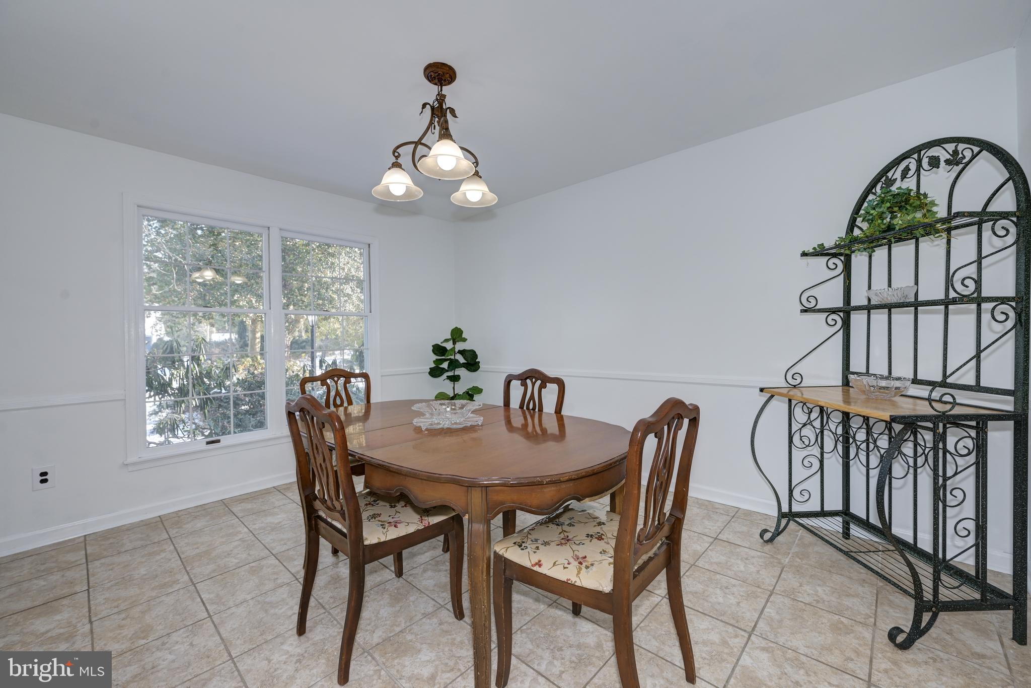 12 Friar Tuck Drive Medford, NJ 08055 - Photo 17 of 68 a view of a dining room with furniture window and outside view