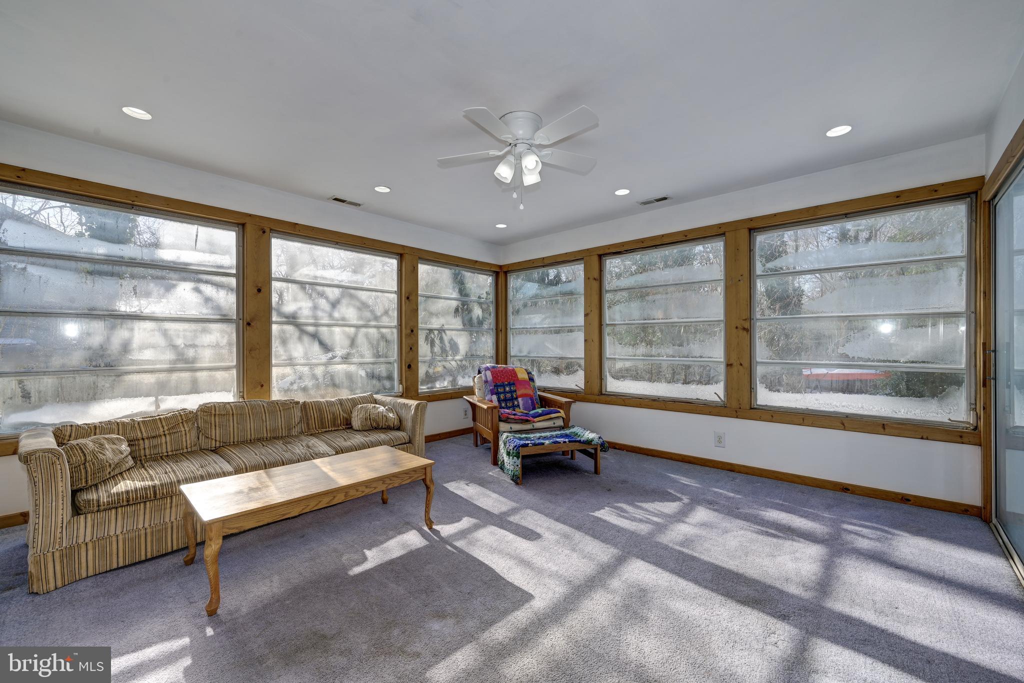 12 Friar Tuck Drive Medford, NJ 08055 - Photo 31 of 68 a living room with furniture and a large window