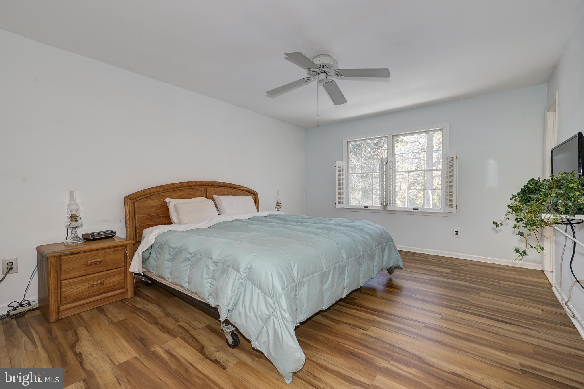 12 Friar Tuck Drive Medford, NJ 08055 - Photo 35 of 68 a bedroom with a bed and window